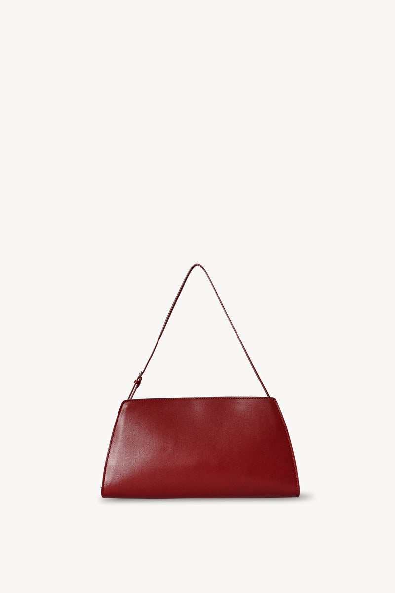 The Row Dalia Glossed-leather Shoulder Bag in Red